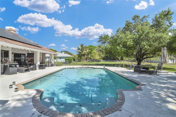 Exterior, Pool, Solar Panels