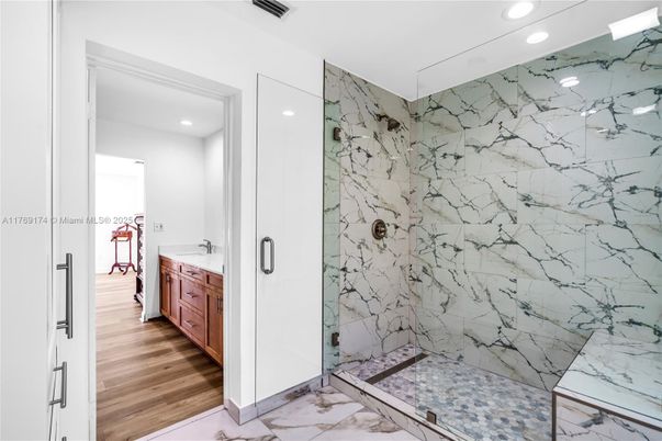 Bathroom, Glass Shower, Interior, Marble, Marble Walls, Recessed Lighting, Wood Texture Flooring