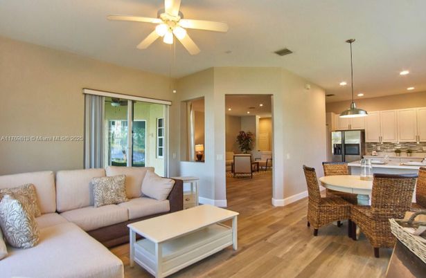 Dining room, Interior, Kitchen, Living room, Pendant Lights, Recessed Lighting, Stainless Steel Appliances, Wood Texture Flooring