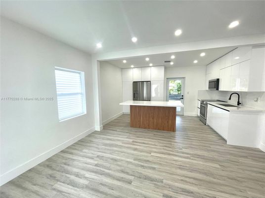 Interior, Kitchen, Recessed Lighting, Stainless Steel Appliances, Wood Texture Flooring