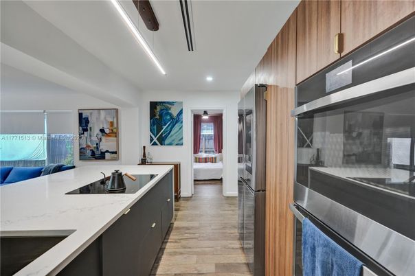 Interior, Kitchen, Recessed Lighting, Stainless Steel Appliances, Wood Texture Flooring