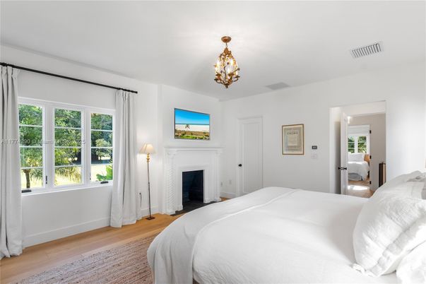 Bedroom, Chandelier, Fireplace, Interior, Wood Texture Flooring