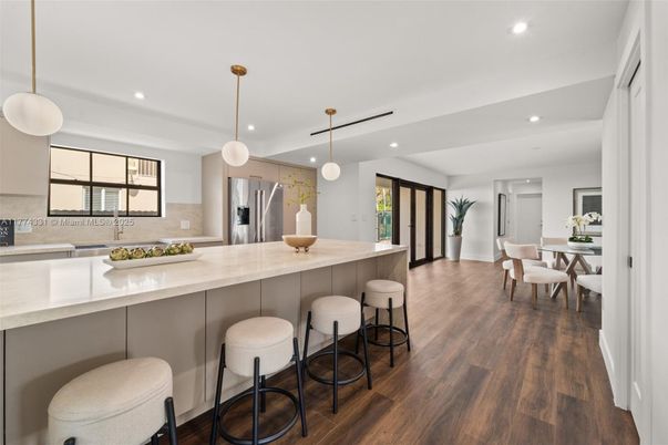 Dining room, Interior, Kitchen, Pendant Lights, Recessed Lighting, Stainless Steel Appliances, Wood Texture Flooring