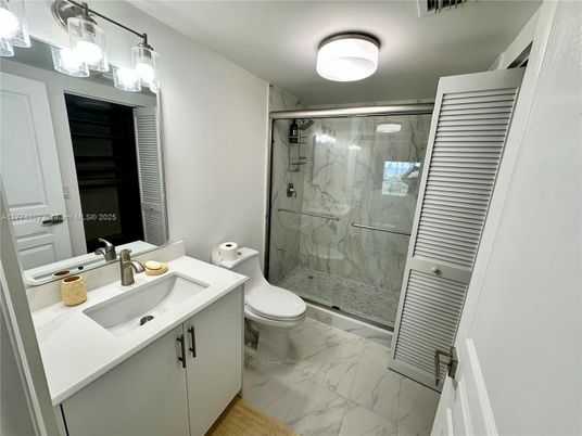 Bathroom, Dual Sink Vanities, Glass Shower, Interior, Marble, Marble Walls