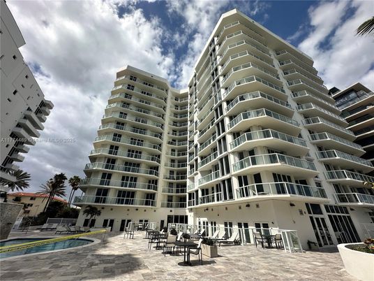 Exterior, Facade, Pool, Condo Building