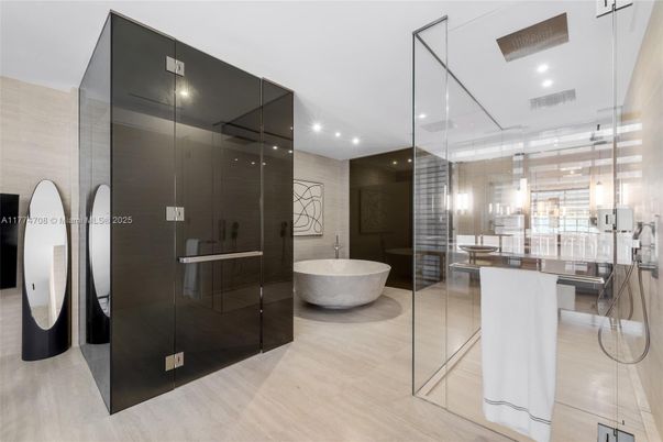 Bathroom, Free Standing Baths, Glass Shower, Interior, Pendant Lights, Recessed Lighting, Wood Texture Flooring