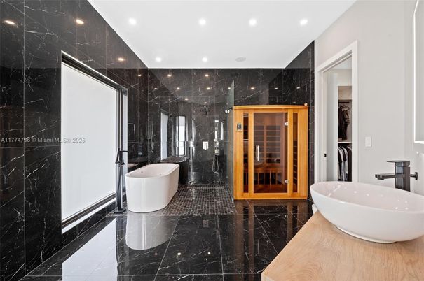 Bathroom, Dual Sink Vanities, Free Standing Baths, Glass Shower, Interior, Marble, Marble Walls, Recessed Lighting