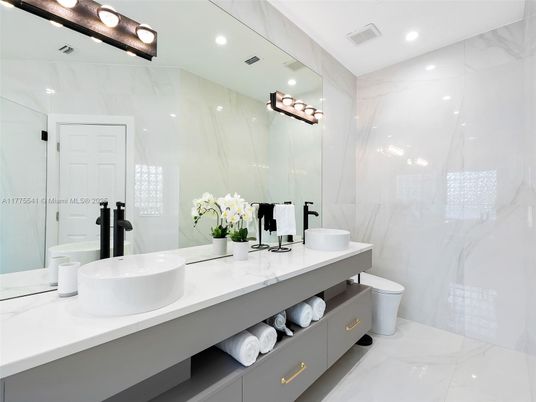 Bathroom, Dual Sink Vanities, Interior, Marble, Marble Walls, Recessed Lighting