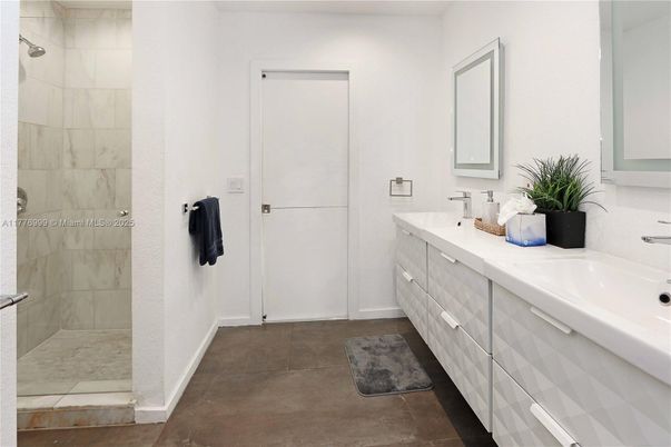 Bathroom, Dual Sink Vanities, Glass Shower, Interior, Marble Walls