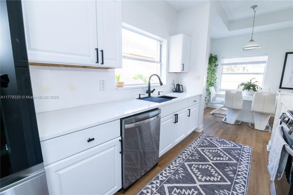 Dining room, Interior, Kitchen, Pendant Lights, Stainless Steel Appliances, Wood Texture Flooring