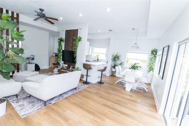 Dining room, Interior, Living room, Pendant Lights, Recessed Lighting, Wood Texture Flooring