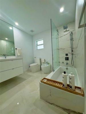 Bathroom, Free Standing Baths, Glass Shower, Interior, Marble Walls, Recessed Lighting