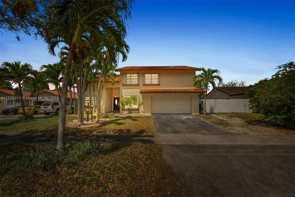 Attached, Backyard, Exterior, Facade, Spanish Mediterranean