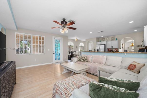 Dining room, Interior, Kitchen, Living room, Recessed Lighting, Stainless Steel Appliances, Wood Texture Flooring