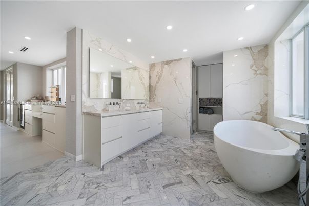 Bathroom, Dual Sink Vanities, Free Standing Baths, Interior, Marble, Marble Walls, Recessed Lighting