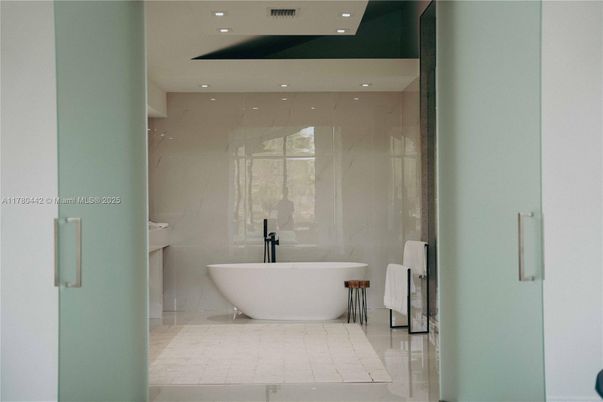 Bathroom, Free Standing Baths, Glass Shower, Interior, Marble Walls, Recessed Lighting