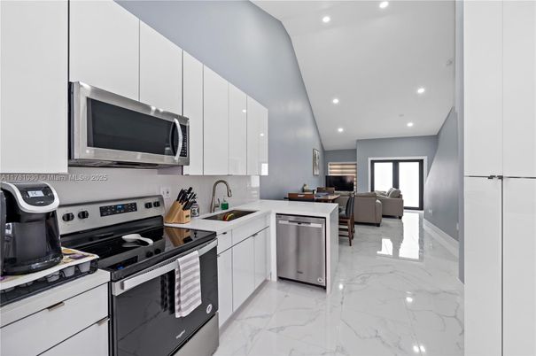 Dining room, Interior, Kitchen, Living room, Marble, Recessed Lighting, Stainless Steel Appliances