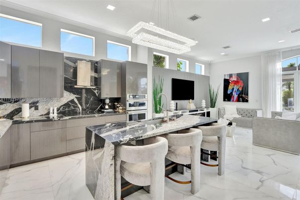 Chandelier, Interior, Kitchen, Living room, Marble, Pendant Lights, Recessed Lighting, Stainless Steel Appliances