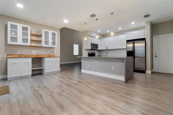 Interior, Kitchen, Pendant Lights, Recessed Lighting, Stainless Steel Appliances, Wood Texture Flooring