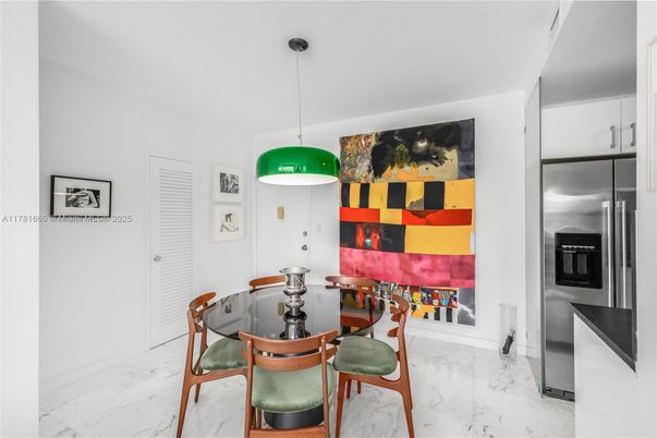 Dining room, Fireplace, Interior, Kitchen, Marble, Pendant Lights, Stainless Steel Appliances
