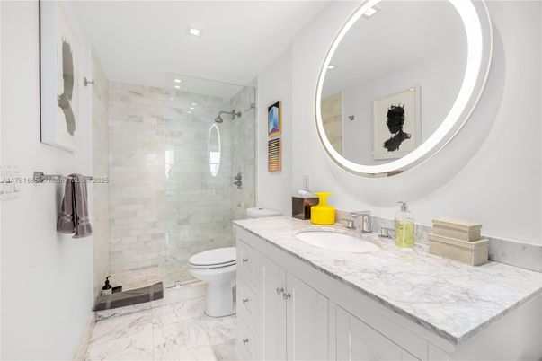 Bathroom, Dual Sink Vanities, Glass Shower, Interior, Marble, Recessed Lighting