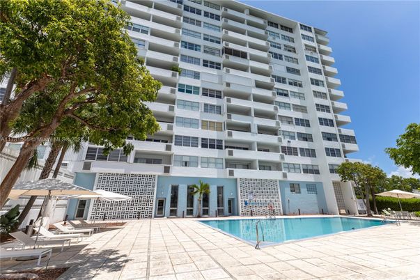 Exterior, Facade, Pool, Condo Building