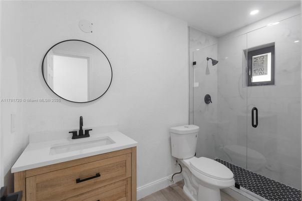 Bathroom, Glass Shower, Interior, Marble Walls, Recessed Lighting, Wood Texture Flooring