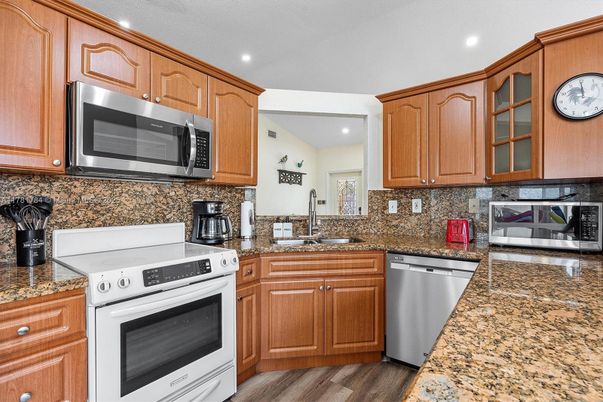 Interior, Kitchen, Recessed Lighting, Stainless Steel Appliances, Wood Texture Flooring