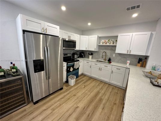 Interior, Kitchen, Recessed Lighting, Stainless Steel Appliances, Wood Texture Flooring