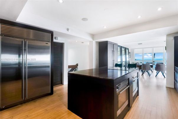 Dining room, Interior, Kitchen, Recessed Lighting, Stainless Steel Appliances, Wood Texture Flooring