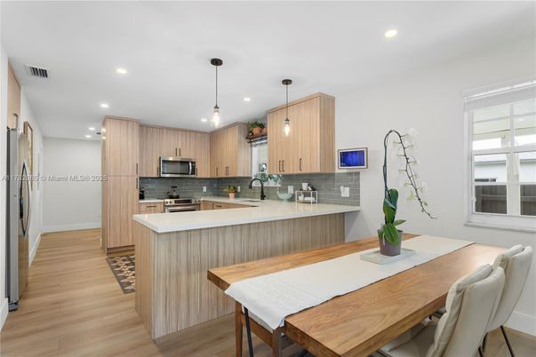Interior, Kitchen, Pendant Lights, Recessed Lighting, Stainless Steel Appliances, Wood Texture Flooring
