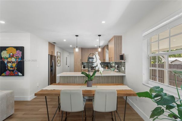 Dining room, Interior, Kitchen, Pendant Lights, Recessed Lighting, Stainless Steel Appliances, Wood Texture Flooring