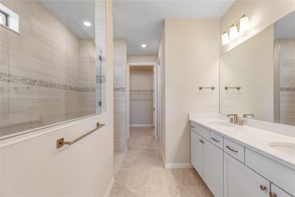 Bathroom, Dual Sink Vanities, Glass Shower, Interior, Recessed Lighting, Walk-in Closets