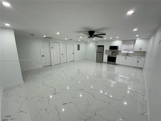 Empty room, Interior, Kitchen, Marble, Recessed Lighting, Stainless Steel Appliances