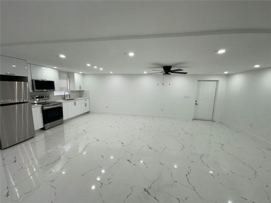 Empty room, Interior, Kitchen, Marble, Recessed Lighting, Stainless Steel Appliances