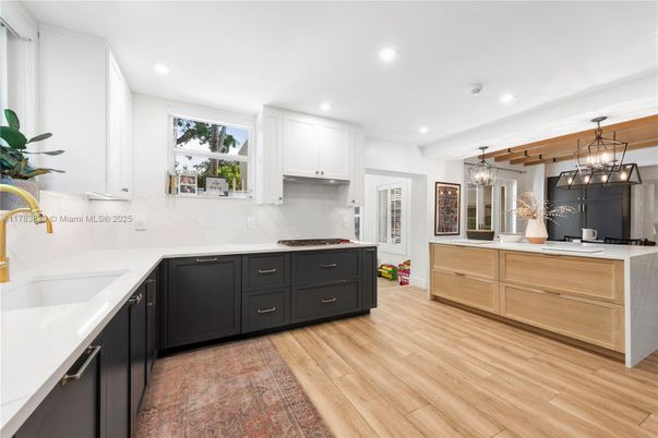 Interior, Kitchen, Marble Walls, Pendant Lights, Recessed Lighting, Wood Texture Flooring