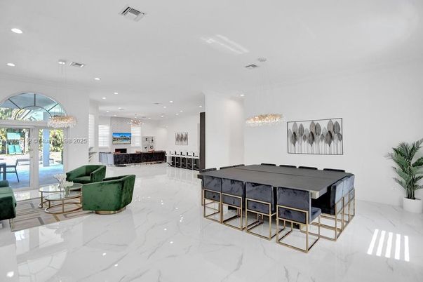 Chandelier, Dining room, Fireplace, Interior, Living room, Marble, Pendant Lights, Recessed Lighting