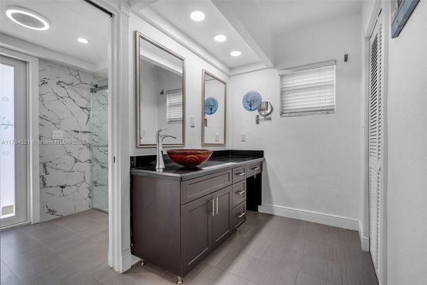 Bathroom, Dual Sink Vanities, Interior, Marble Walls, Recessed Lighting
