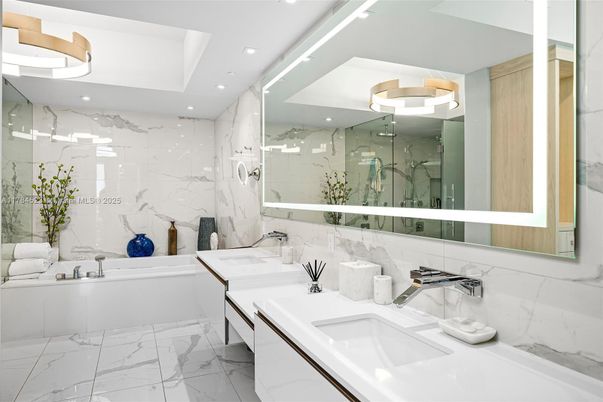 Bathroom, Dual Sink Vanities, Glass Shower, Interior, Marble, Marble Walls, Recessed Lighting