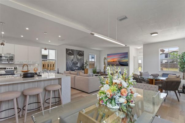Dining room, Interior, Kitchen, Living room, Pendant Lights, Recessed Lighting, Stainless Steel Appliances, Wood Texture Flooring