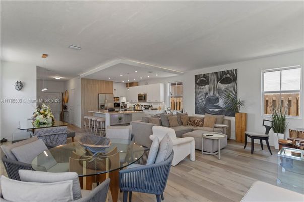 Dining room, Interior, Kitchen, Living room, Recessed Lighting, Stainless Steel Appliances, Wood Texture Flooring
