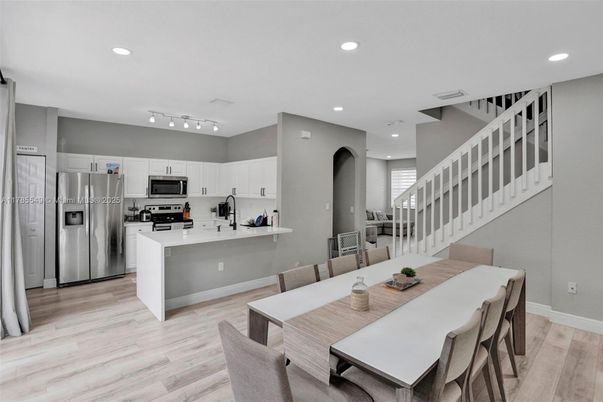 Dining room, Interior, Kitchen, Recessed Lighting, Stainless Steel Appliances, Wood Texture Flooring
