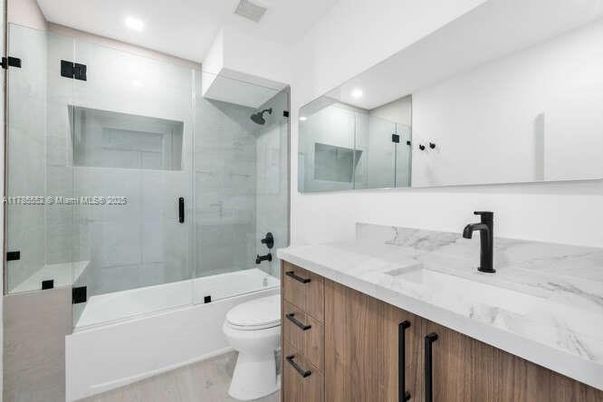 Bathroom, Glass Shower, Interior, Marble Walls, Recessed Lighting, Wood Texture Flooring