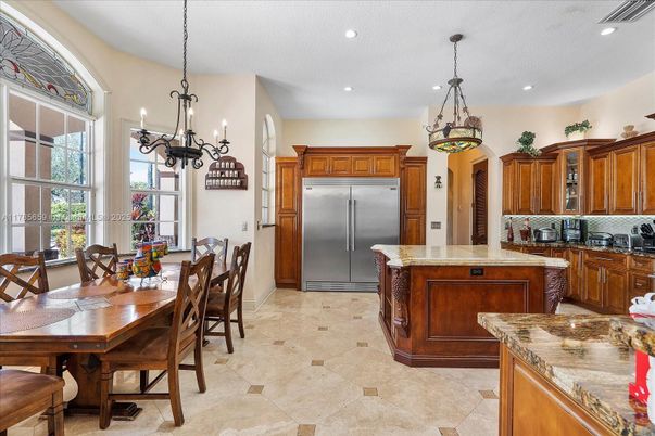 Chandelier, Dining room, Interior, Kitchen, Pendant Lights, Recessed Lighting, Stainless Steel Appliances