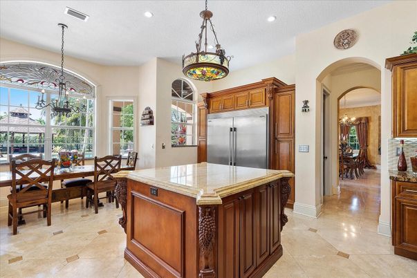 Chandelier, Dining room, Interior, Kitchen, Pendant Lights, Recessed Lighting, Stainless Steel Appliances