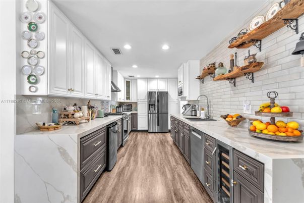 Interior, Kitchen, Recessed Lighting, Stainless Steel Appliances, Wood Texture Flooring