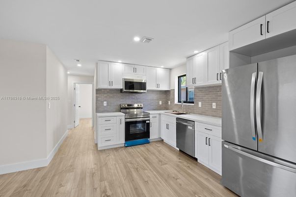 Interior, Kitchen, Recessed Lighting, Stainless Steel Appliances, Wood Texture Flooring