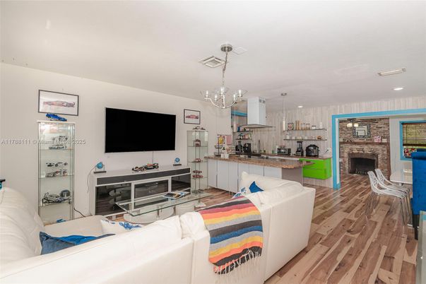 Fireplace, Interior, Kitchen, Living room, Pendant Lights, Recessed Lighting, Stone Walls, Wood Texture Flooring