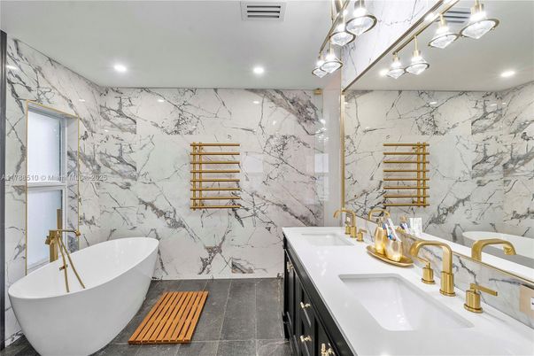 Bathroom, Dual Sink Vanities, Free Standing Baths, Interior, Marble Walls, Recessed Lighting