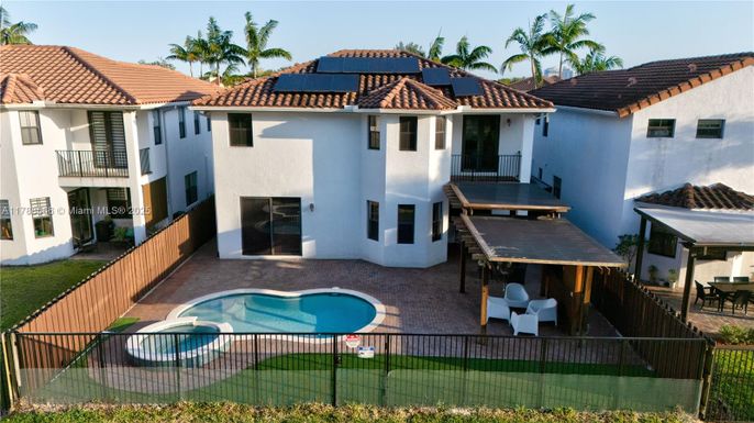 Exterior, Pool, Solar Panels